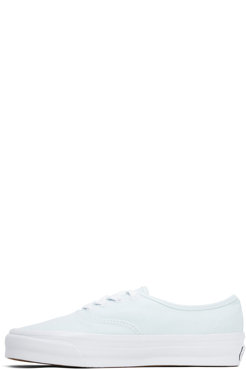 Low-top duck canvas sneakers in blue. 

· Lace-up closure
· Logo flag at outer side
· Rubberized logo patch at heel
· Textured rubber midsole
· Treaded rubber sole
· Contrast stitching in white

Supplier color: Blue