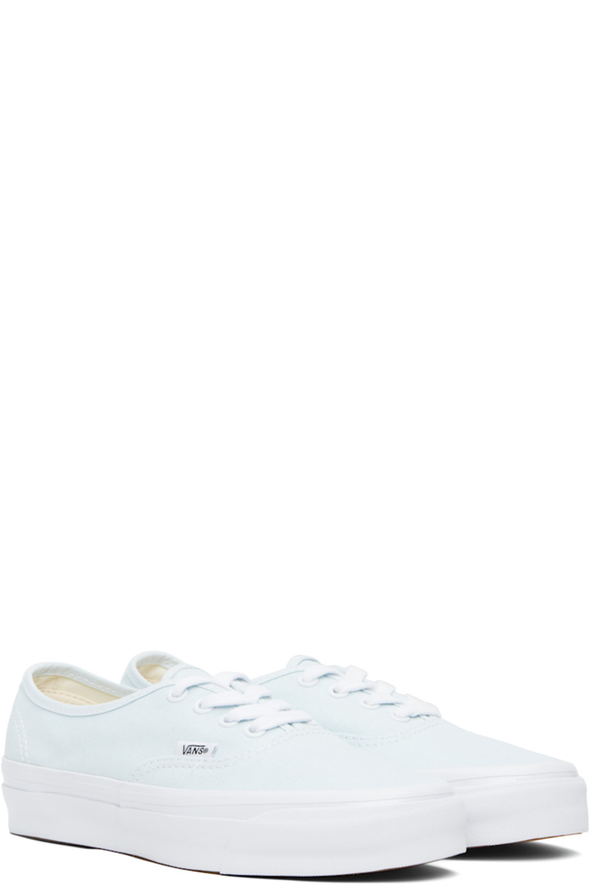 Low-top duck canvas sneakers in blue. 

· Lace-up closure
· Logo flag at outer side
· Rubberized logo patch at heel
· Textured rubber midsole
· Treaded rubber sole
· Contrast stitching in white

Supplier color: Blue