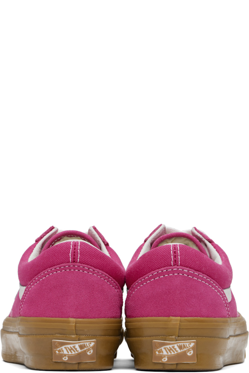 Low-top paneled suede and 8 oz canvas sneakers in pink. 

· Lace-up closure
· Padded collar 
· Grained leather Sidestripe™ at sides
· Rubberized logo patch at heel
· Removable padded Sola ADC foam footbed
· Textured rubber midsole
· Treaded rubber sole
· Contrast stitching in white 

Supplier color: Raspberry pink/Gum