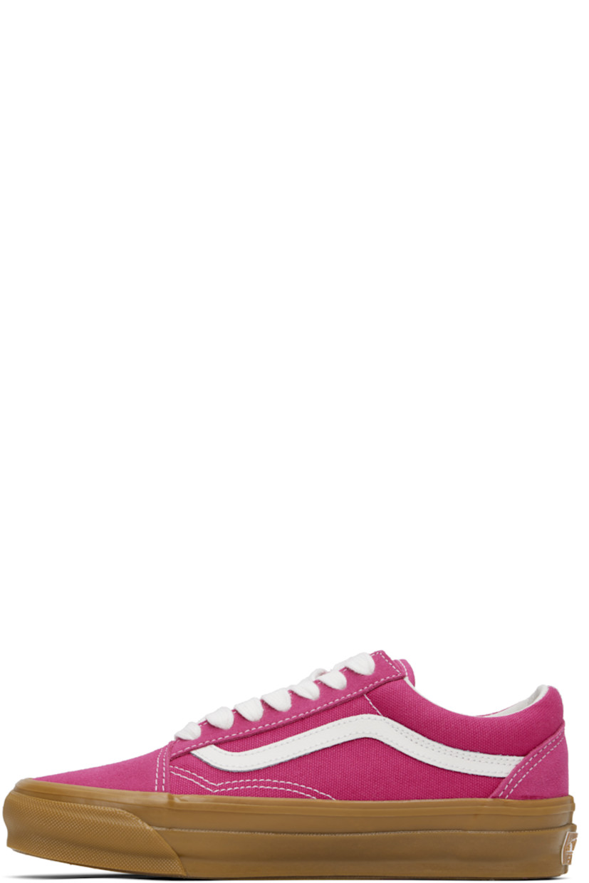 Low-top paneled suede and 8 oz canvas sneakers in pink. 

· Lace-up closure
· Padded collar 
· Grained leather Sidestripe™ at sides
· Rubberized logo patch at heel
· Removable padded Sola ADC foam footbed
· Textured rubber midsole
· Treaded rubber sole
· Contrast stitching in white 

Supplier color: Raspberry pink/Gum