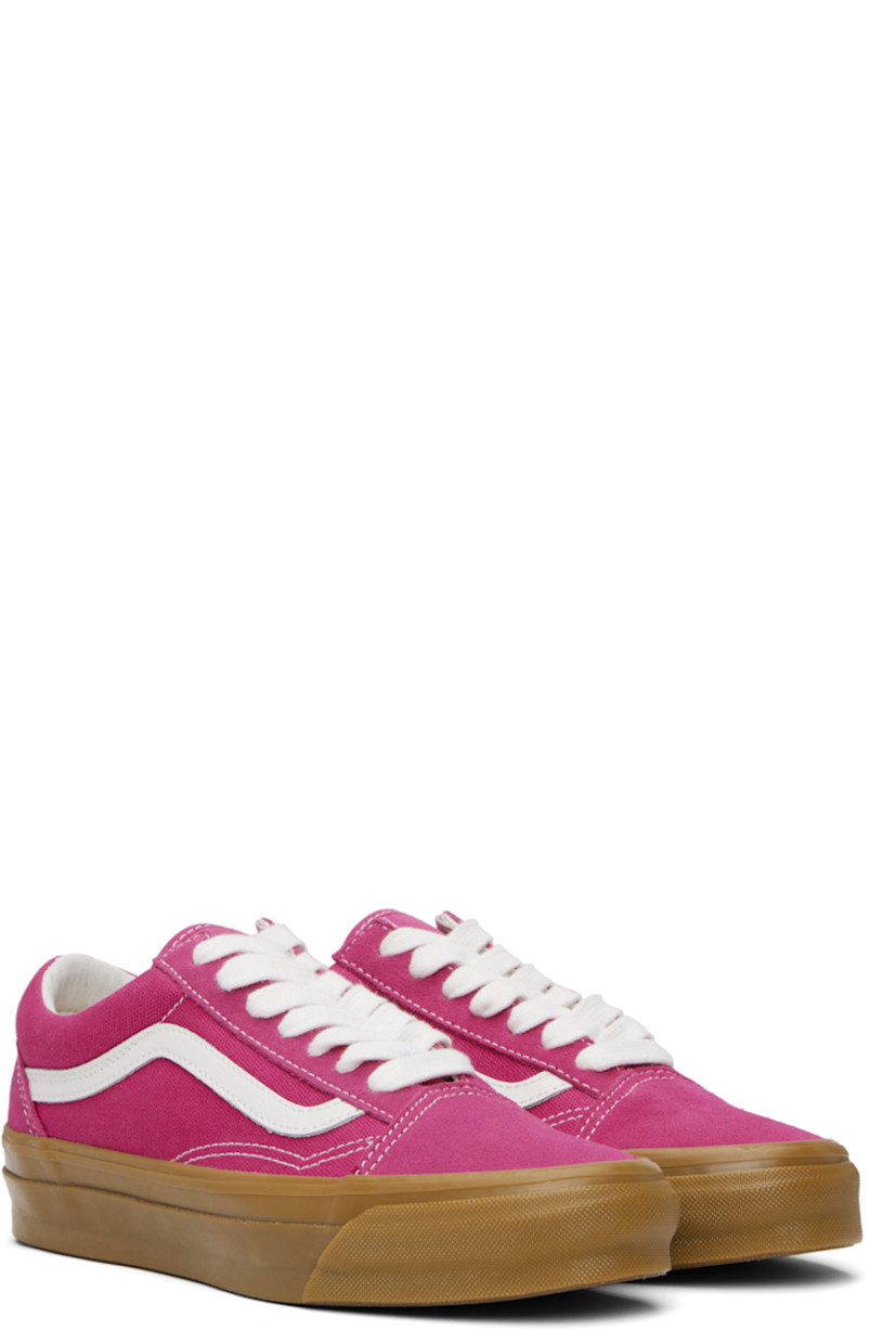 Low-top paneled suede and 8 oz canvas sneakers in pink. 

· Lace-up closure
· Padded collar 
· Grained leather Sidestripe™ at sides
· Rubberized logo patch at heel
· Removable padded Sola ADC foam footbed
· Textured rubber midsole
· Treaded rubber sole
· Contrast stitching in white 

Supplier color: Raspberry pink/Gum