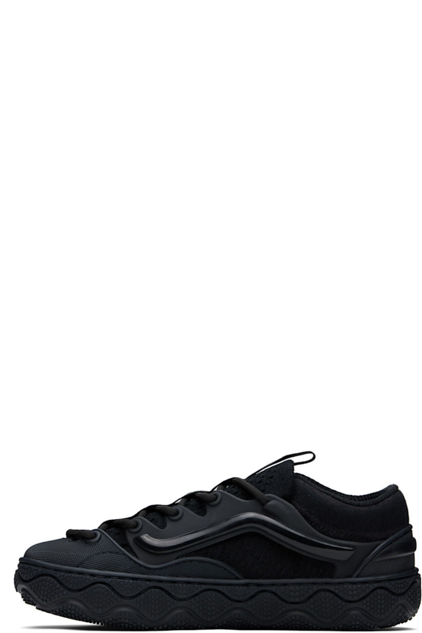 Low-top knit sneakers in black.

· Perforations throughout
· Textured rubber cap toe and heel counter
· Lace-up closure
· Pull-loop at tongue
· Padded collar
· Rubber overlay at sides
· Cushioned Sola Foam ADC insole
· Mesh lining
· Textured rubber midsole
· Treaded rubber sole

Supplier color: Black