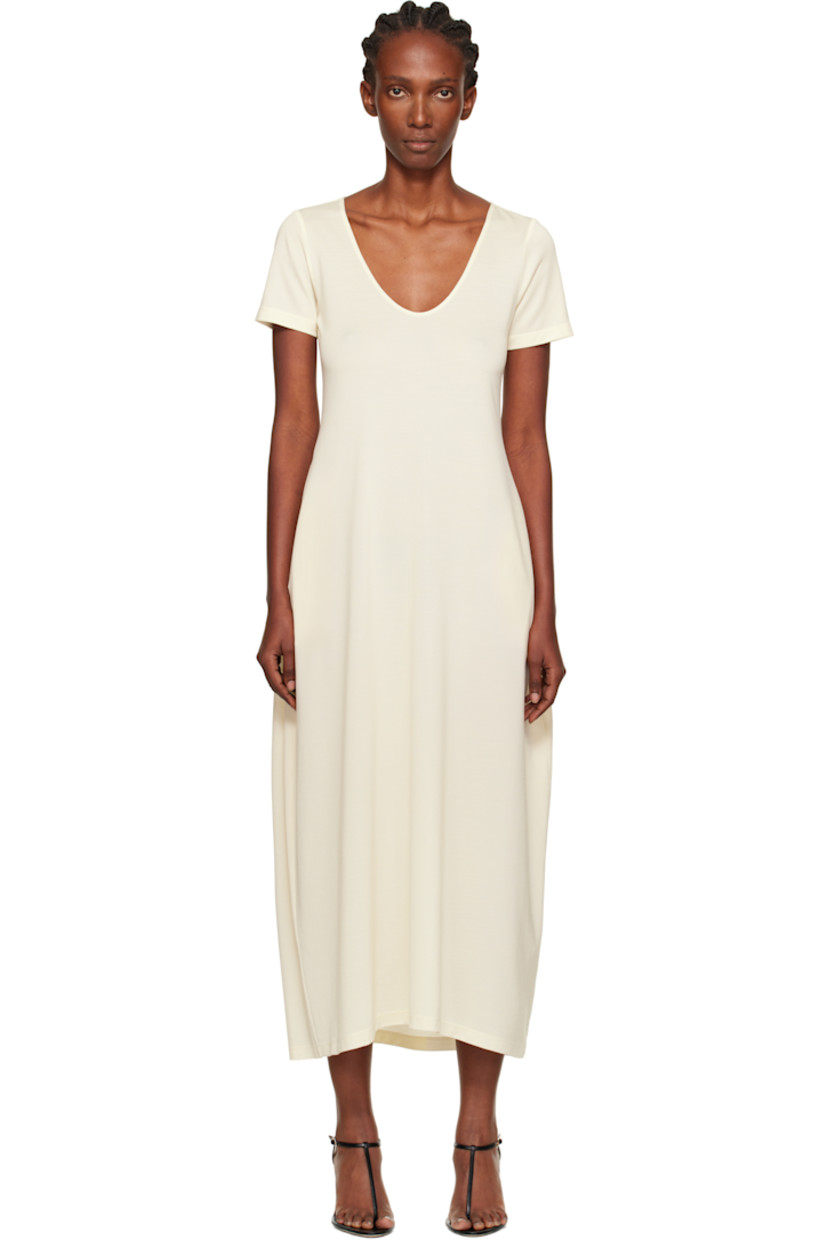 Wool-blend crêpe jersey midi dress.

· Plunging scoop neck
· Seam pockets at waist

Supplier color: White