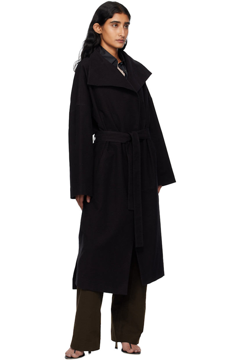 Stretch cotton moleskin coat. 

· Notched lapel 
· Open front 
· Belt loops 
· Detachable self-tie belt 
· Welt pocket at waist 
· Vented side seams
· Dropped shoulders
· Full satin lining 

Supplier color: Black