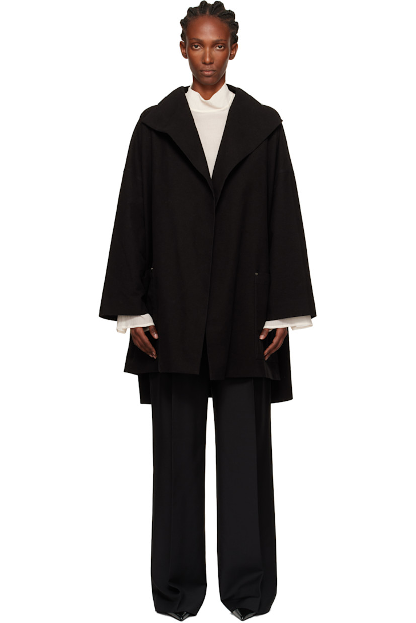 Stretch cotton moleskin coat.

· Shawl lapel
· Open front
· Patch pockets at waist
· Droptail hem
· Vented side seams
· Dropped shoulders
· Full satin lining

Supplier color: Black