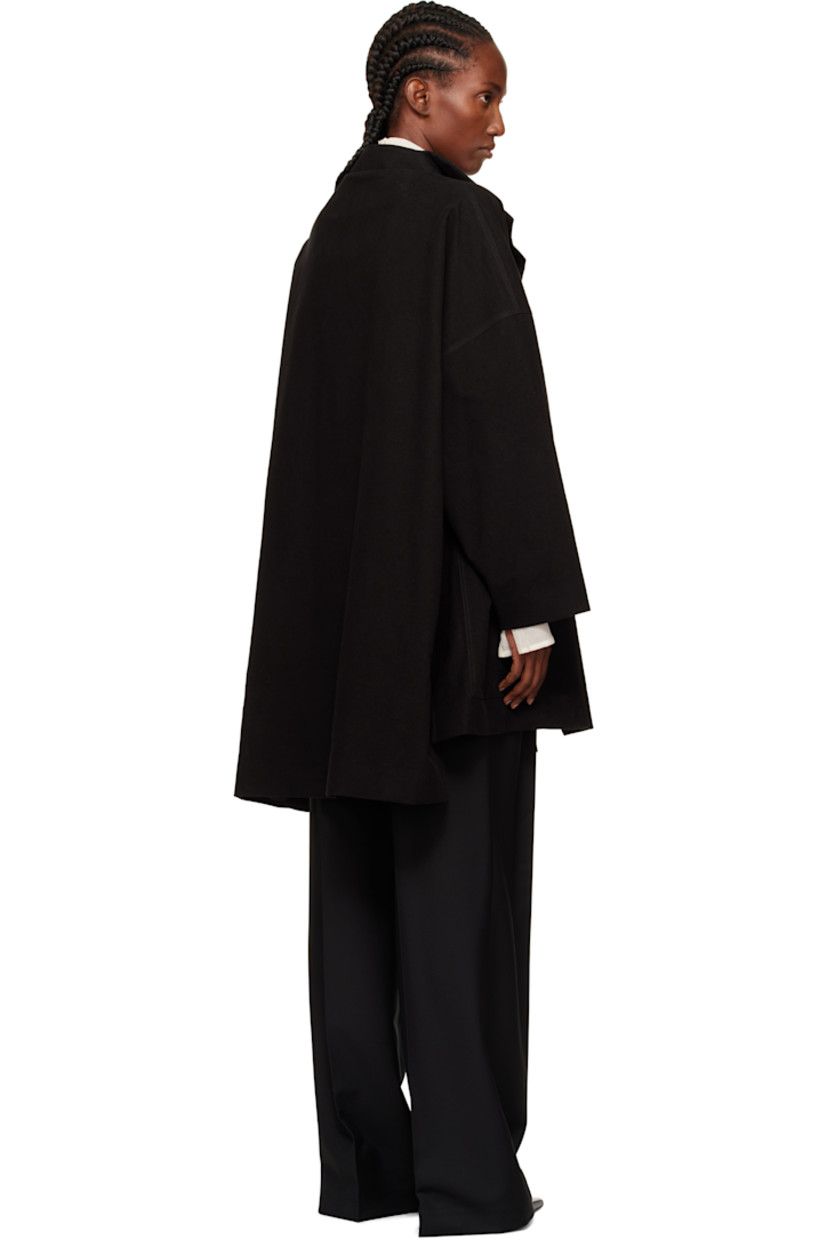 Stretch cotton moleskin coat.

· Shawl lapel
· Open front
· Patch pockets at waist
· Droptail hem
· Vented side seams
· Dropped shoulders
· Full satin lining

Supplier color: Black
