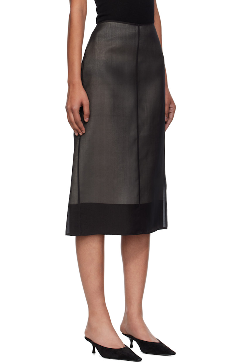 Sheer silk organza midi skirt. 

· Central seam at front and back 
· Darts and concealed zip closure at back waist
· Full silk twill lining

Supplier color: Black/Cream