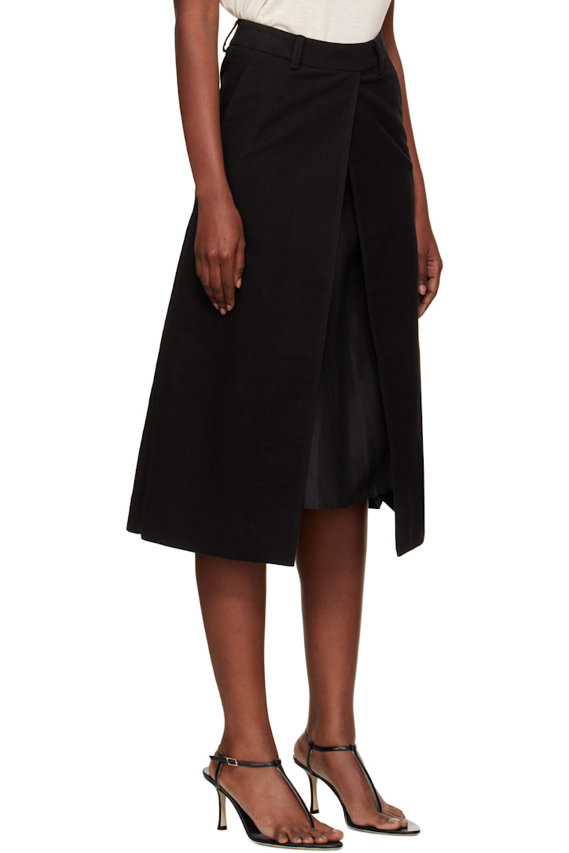 Stretch cotton moleskin midi skirt.

· Belt loops
· Two-pocket styling
· Vent and exposed slip at front
· Concealed zip closure at side seam
· Full satin slip-style lining

Supplier color: Black