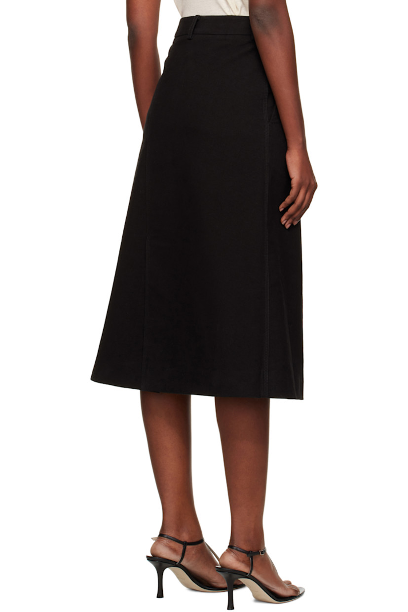 Stretch cotton moleskin midi skirt.

· Belt loops
· Two-pocket styling
· Vent and exposed slip at front
· Concealed zip closure at side seam
· Full satin slip-style lining

Supplier color: Black