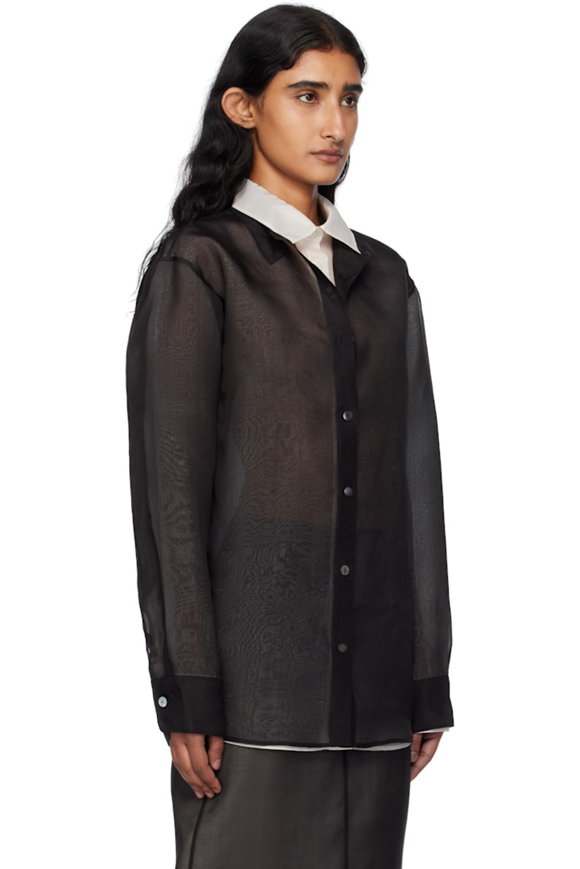 Sheer silk organza shirt. 

· Layered construction 
· Spread collar 
· Button closure 
· Pleat at buttoned barrel cuffs
· Full silk twill lining

Supplier color: Black/Cream