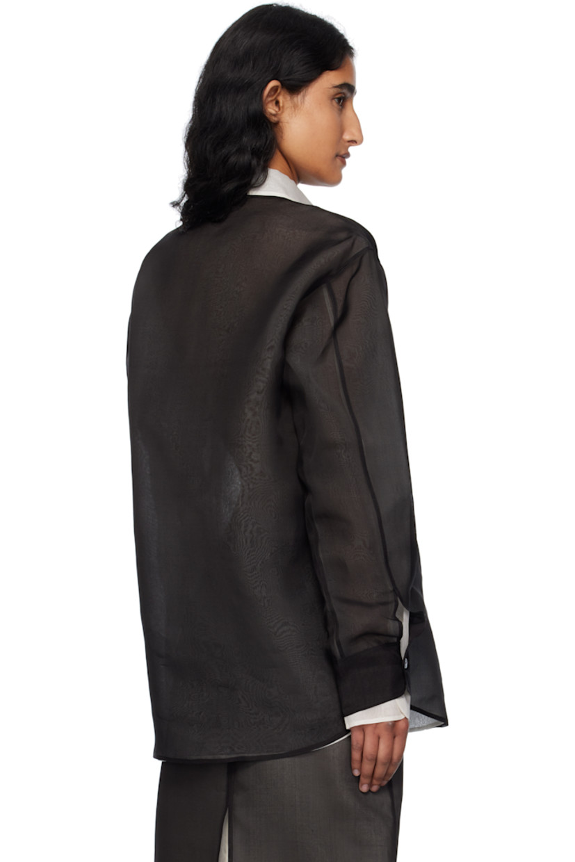 Sheer silk organza shirt. 

· Layered construction 
· Spread collar 
· Button closure 
· Pleat at buttoned barrel cuffs
· Full silk twill lining

Supplier color: Black/Cream