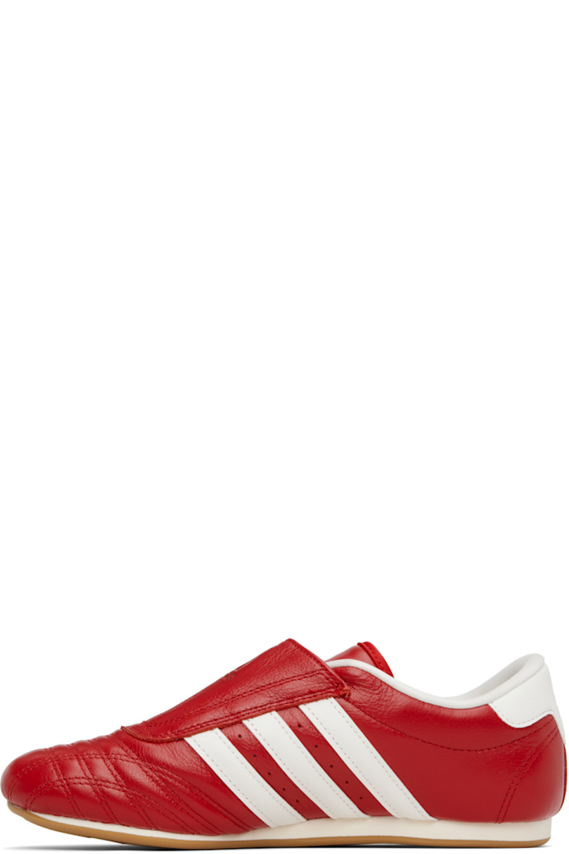 Low-top buffed leather sneakers.

· Quilted detailing at toe
· Logo embossed at vamp and heel tab
· Concealed elasticized gusset
· Padded tongue and collar
· Signature stripes and perforations at sides
· Buffed leather and mesh lining
· Treaded rubber sole

Supplier color: Red/Off white/Gum