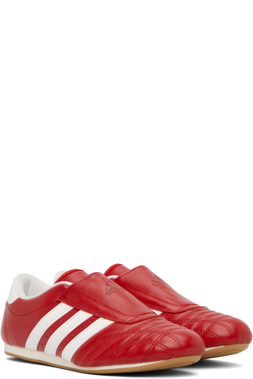 Low-top buffed leather sneakers.

· Quilted detailing at toe
· Logo embossed at vamp and heel tab
· Concealed elasticized gusset
· Padded tongue and collar
· Signature stripes and perforations at sides
· Buffed leather and mesh lining
· Treaded rubber sole

Supplier color: Red/Off white/Gum