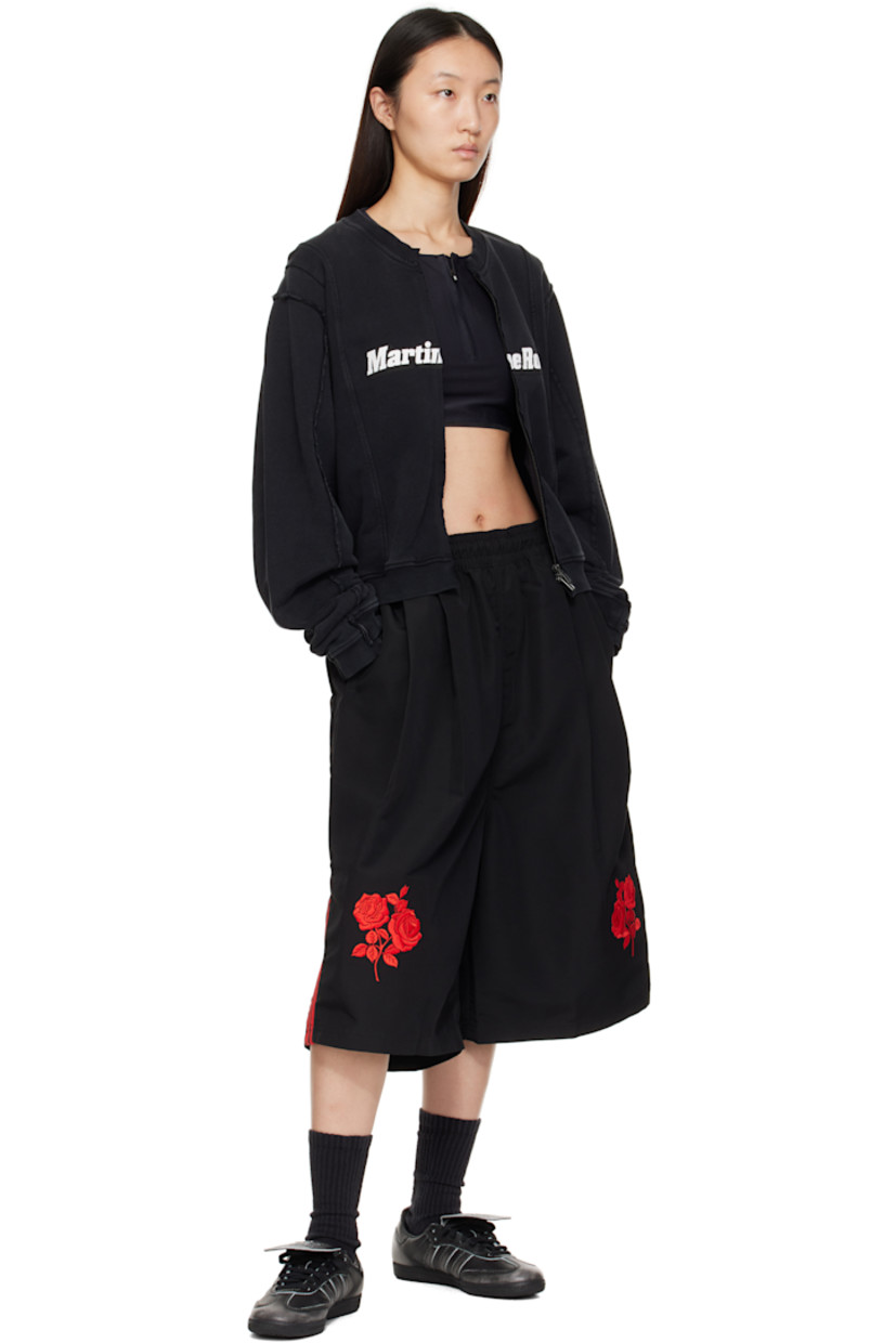 Low-top buffed leather sneakers.

· Fading throughout
· Quilted toe and heel tab
· Lace-up closure
· Logo-embossed at extended foldover tongue
· Padded collar
· Text stamp at outer side
· Signature serrated stripes at sides
· Mesh lining
· Treaded rubber sole

Supplier color: Core black/Core black/Cloud white