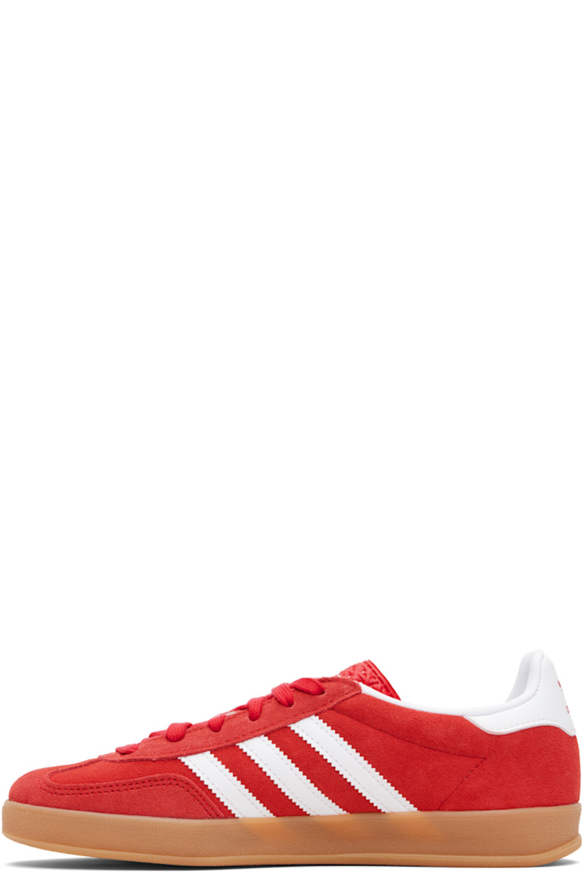 Low-top suede sneakers.

· Lace-up closure
· Logo printed at textured tongue
· Padded collar
· Text stamp at outer side
· Signature serrated stripes at sides
· Logo printed at heel tab
· Jersey lining
· Treaded rubber sole
· Includes alternate laces

Supplier color: Better scarlet/Cloud white/Gum