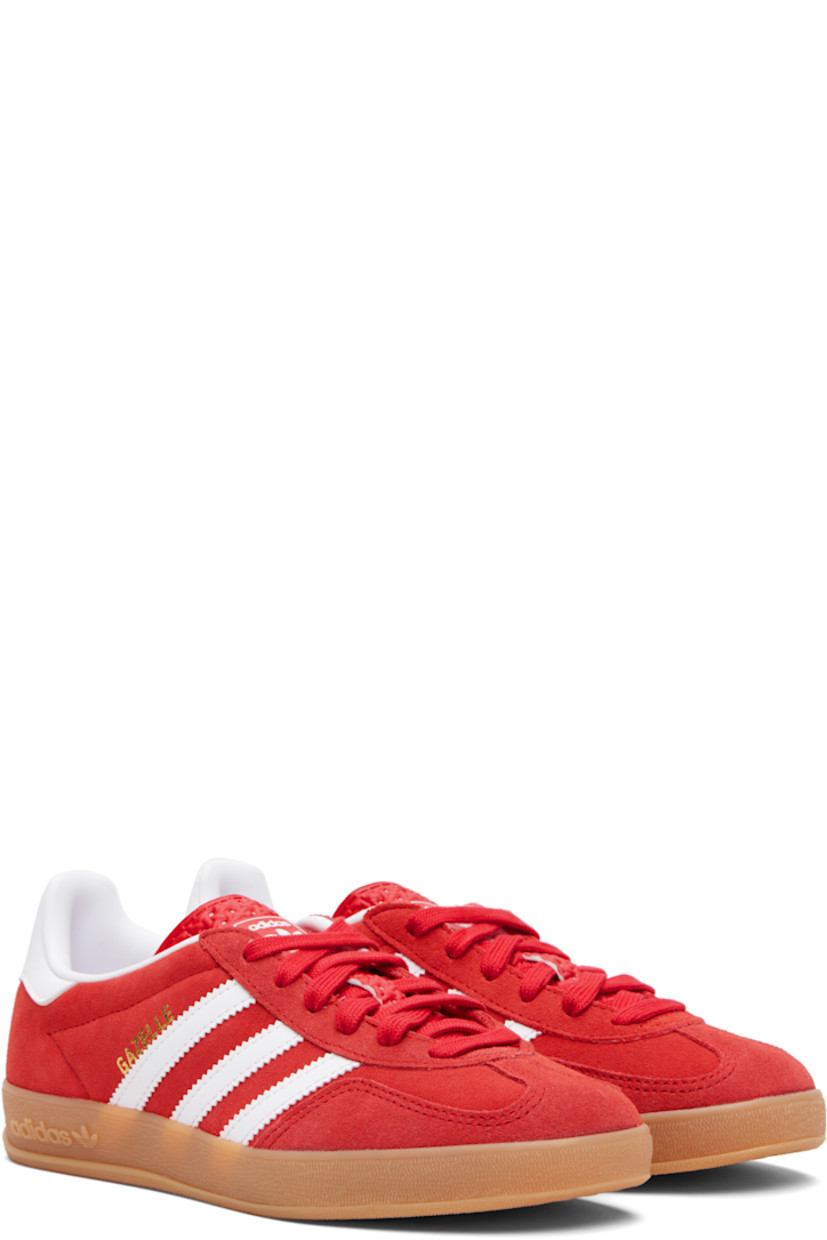 Low-top suede sneakers.

· Lace-up closure
· Logo printed at textured tongue
· Padded collar
· Text stamp at outer side
· Signature serrated stripes at sides
· Logo printed at heel tab
· Jersey lining
· Treaded rubber sole
· Includes alternate laces

Supplier color: Better scarlet/Cloud white/Gum