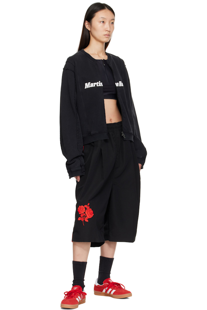 Low-top suede sneakers.

· Lace-up closure
· Logo printed at textured tongue
· Padded collar
· Text stamp at outer side
· Signature serrated stripes at sides
· Logo printed at heel tab
· Jersey lining
· Treaded rubber sole
· Includes alternate laces

Supplier color: Better scarlet/Cloud white/Gum