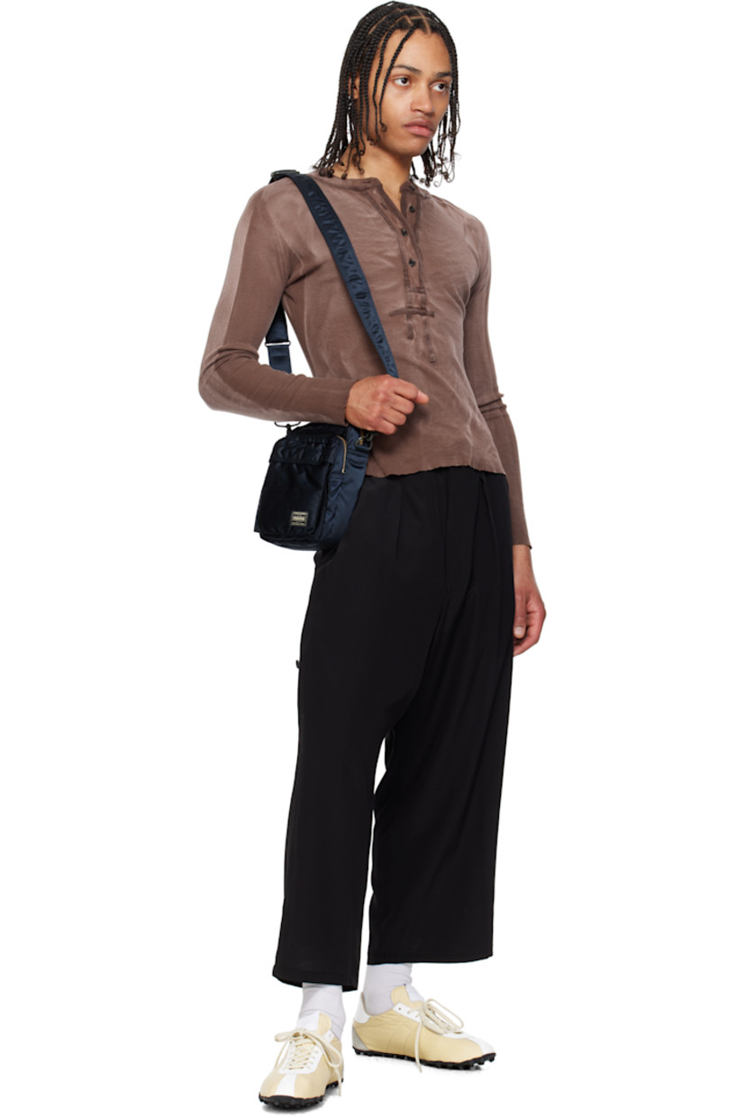 Nylon twill messenger bag in navy.

· Adjustable and detachable crossbody strap
· Logo patch at face
· Bellows and zip pocket
· Patch pocket at back face
· Zip closure
· Patch pocket at interior
· Taffeta lining
· Logo-engraved gold-tone hardware
· H8" x W6" x D3"

Supplier color: Iron blue