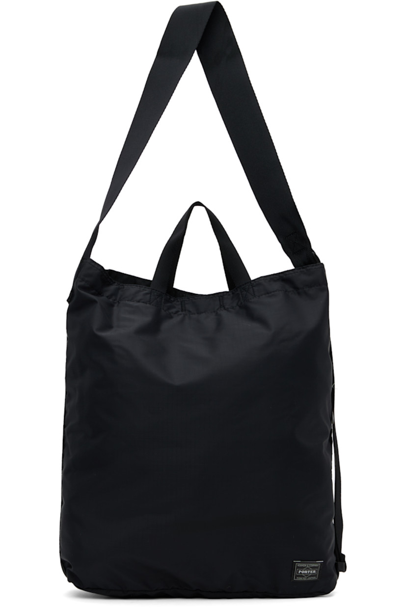 Packable coated nylon ripstop tote in black.

· Fixed carry handles
· Adjustable crossbody strap
· Logo patch at face
· Adjustable shoulder strap at side
· Press-stud closure
· Zip and patch pockets at interior
· H15" x W14.5" x D3.5"

Part of the Flex collection.

Supplier color: Black