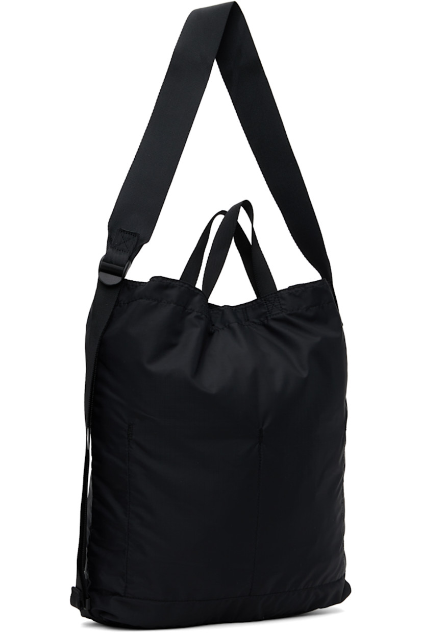 Packable coated nylon ripstop tote in black.

· Fixed carry handles
· Adjustable crossbody strap
· Logo patch at face
· Adjustable shoulder strap at side
· Press-stud closure
· Zip and patch pockets at interior
· H15" x W14.5" x D3.5"

Part of the Flex collection.

Supplier color: Black