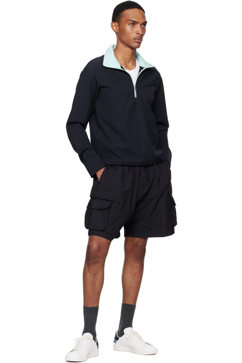 Low-top buffed leather sneakers.

· Text embroidered at vamp
· Lace-up closure
· Logo embossed at tongue
· Padded collar
· Perforated stripes at sides
· Beaded detailing at heel tab
· Treaded rubber sole

Part of the adidas Originals by Edison Chen collaboration.

Supplier color: Core white/Night navy/Core white