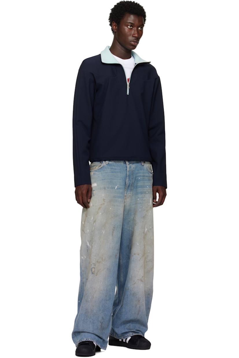 Low-top buffed leather sneakers.

· Textured rubber cap toe
· Lace-up closure
· Logo embossed at tongue and heel tab
· Padded tongue and collar
· Text printed at outer side
· Perforations and signature serrated stripes at sides
· Terrycloth lining
· Treaded rubber sole

Supplier color: Core black/Cloud white/Core black