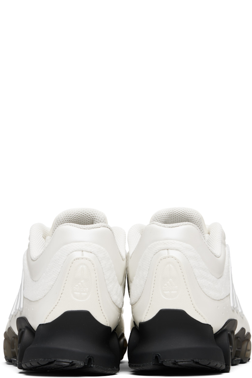 Low-top mesh and polished faux-leather sneakers.

· Textured rubber trim at toe and heel
· Lace-up closure
· Logo embossed at tongue
· Padded tongue and collar
· Rubber signature stripe appliqués at sides
· Logo embossed at heel tab
· Treaded rubber sole

Supplier color: Zero metallic/Matte silver/Black