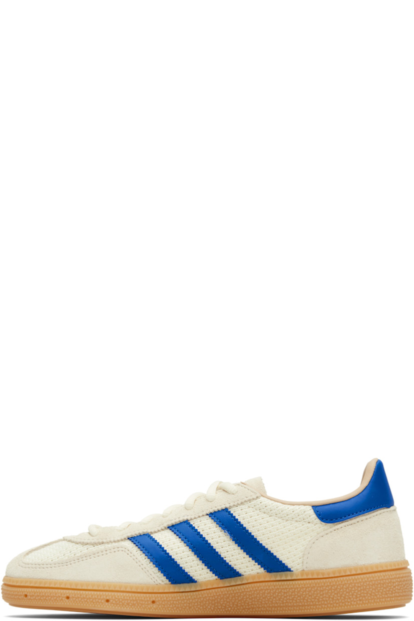 Low-top mesh and suede sneakers.

· Lace-up closure
· Logo patch at tongue
· Padded collar
· Signature serrated stripes at sides
· Mesh lining
· Treaded rubber sole

Supplier color: Cream white/Blue/Warm sandstone