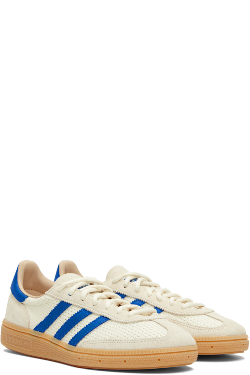 Low-top mesh and suede sneakers.

· Lace-up closure
· Logo patch at tongue
· Padded collar
· Signature serrated stripes at sides
· Mesh lining
· Treaded rubber sole

Supplier color: Cream white/Blue/Warm sandstone