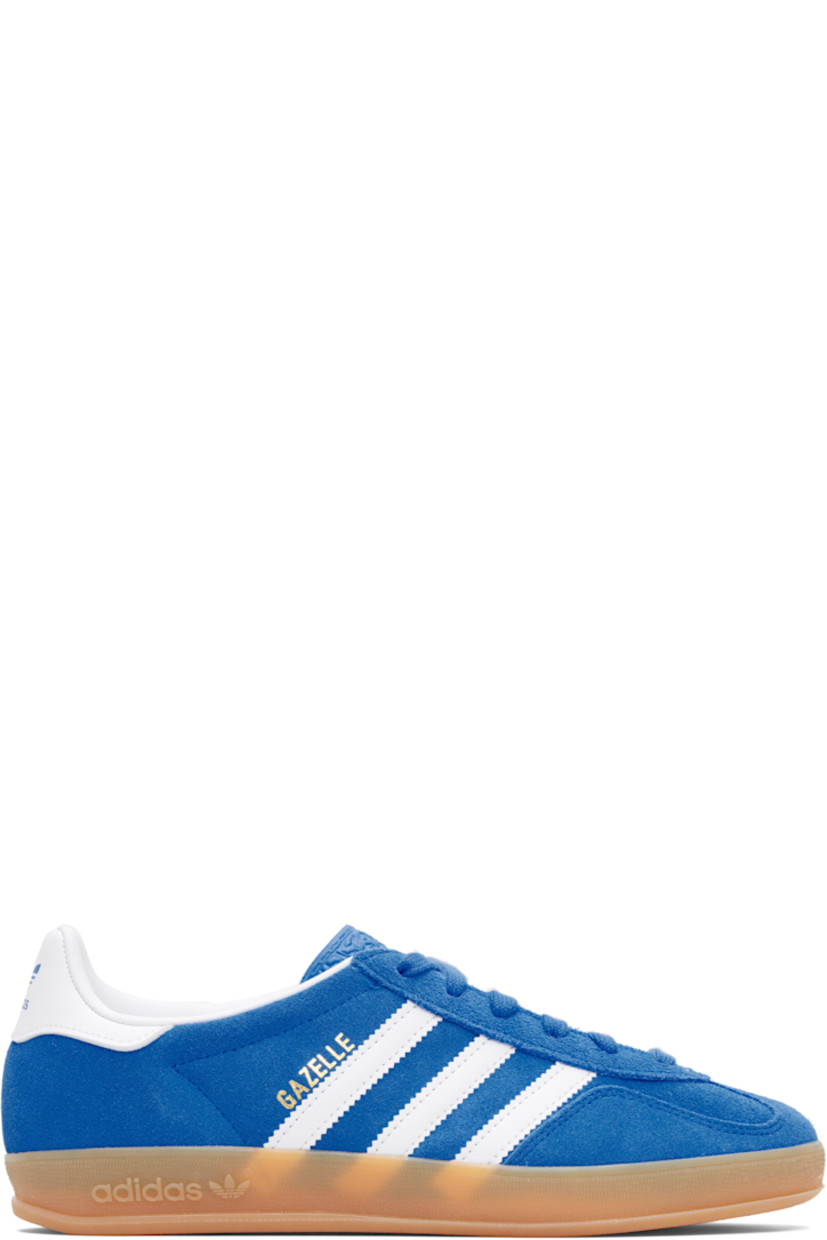 Low-top suede sneakers.

· Lace-up closure
· Logo printed at textured tongue
· Padded collar
· Text stamp at outer side
· Signature serrated stripes at sides
· Logo printed at heel tab
· Jersey lining
· Treaded rubber sole
· Includes alternate laces

Supplier color: Blue bird/Cloud white/Gum