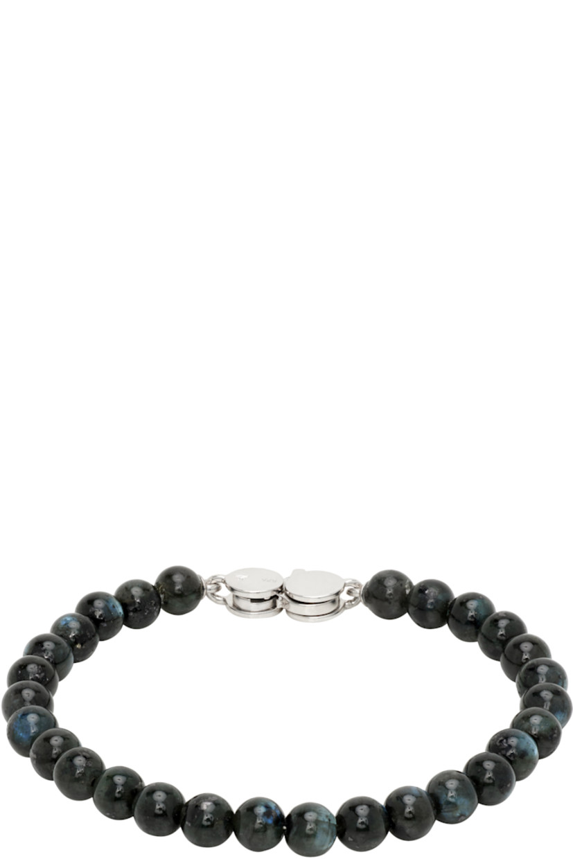 Handcrafted beaded larvikite bracelet in black.

· Lobster-clasp fastening
· Rhodium-plated recycled sterling silver hardware

Supplier clor: 925 silver