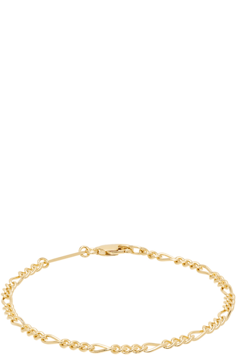 Figaro chain bracelet in 18k gold-plated recycled sterling silver. Logo plaque at lobster-clasp fastening. 

Supplier color: S925/18k gold