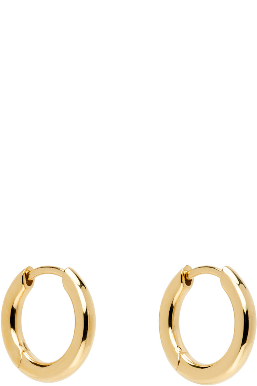 Pair of hoop earrings in 18k gold-plated recycled sterling silver. 

· Hinged-post fastening
· D0.5"

Supplier color: S925/18k gold