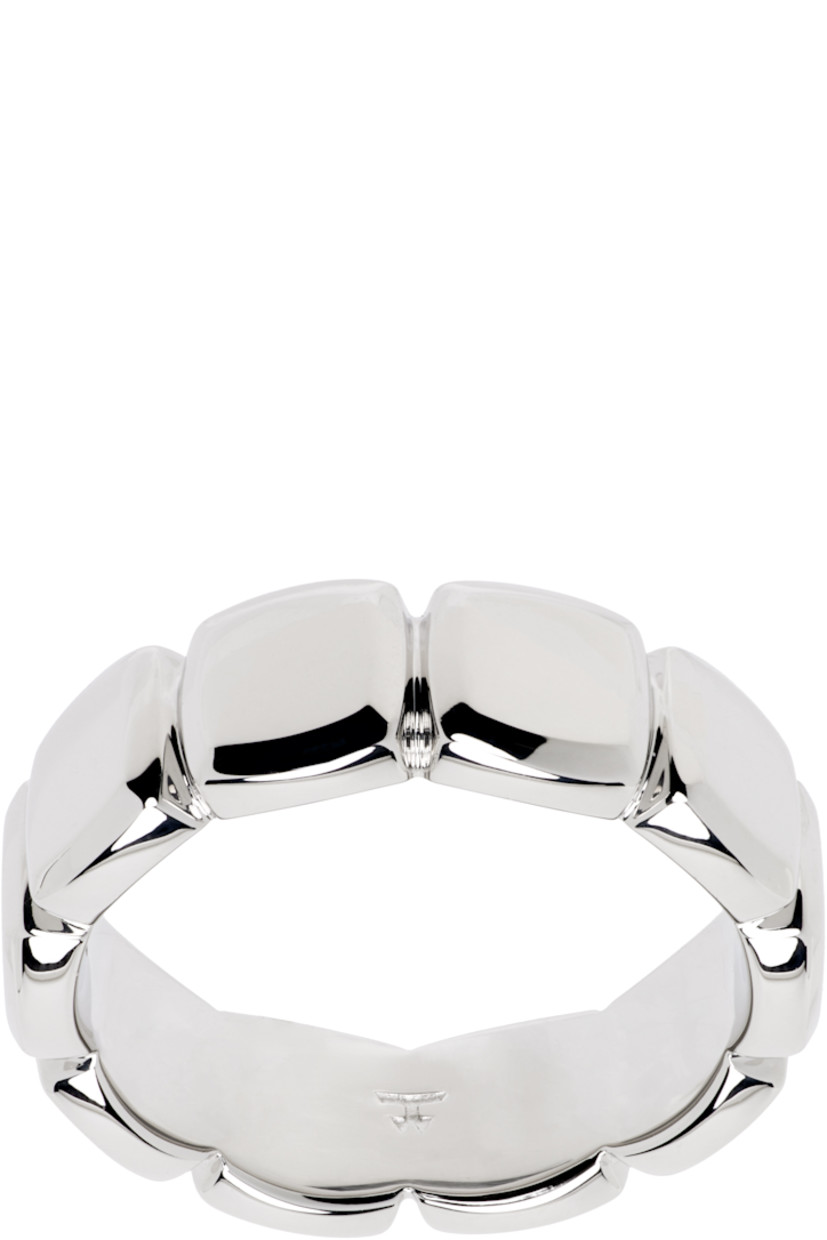 Band ring in rhodium-plated sterling silver. Hallmarking at inner band.

Supplier color: 925 sterling