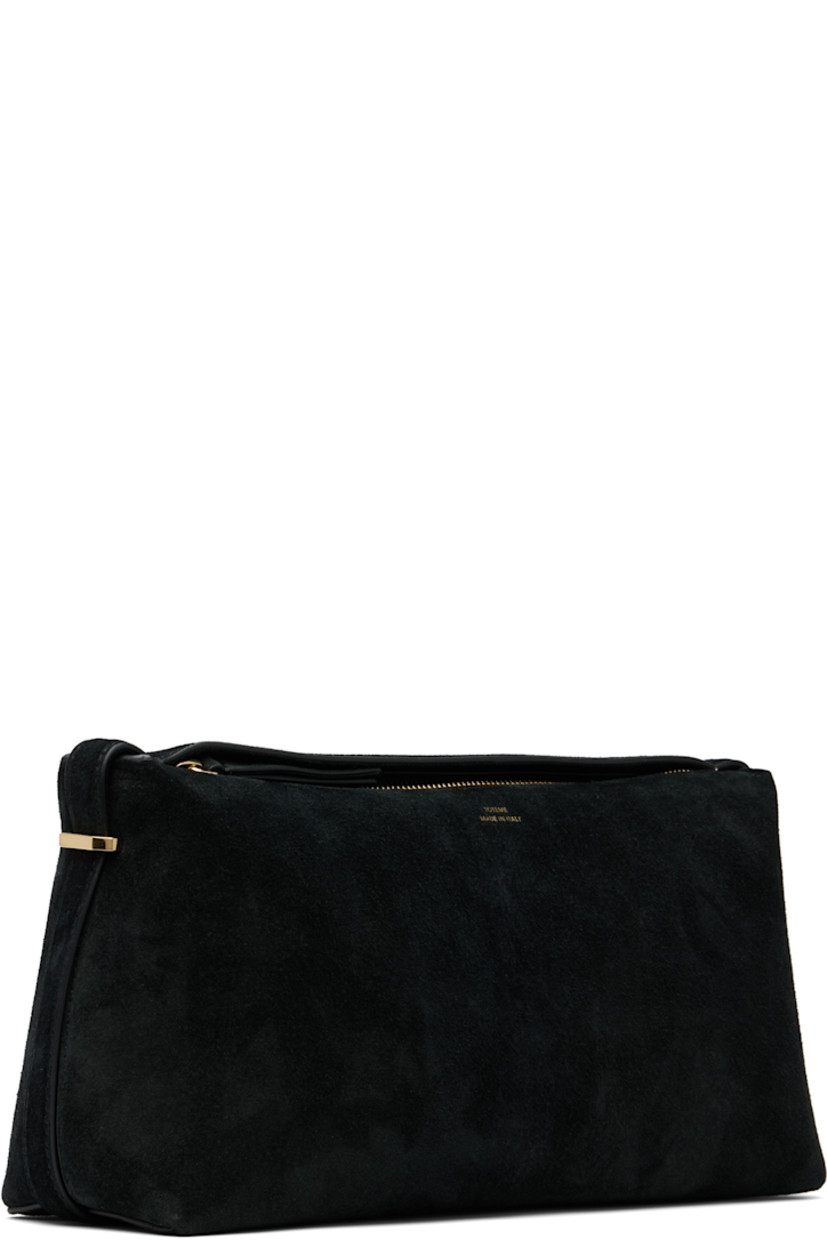 LWG-certified suede clutch. 

· Gold-tone logo stamp at face
· Tab-slot strap at base
· Zip closure
· Card slot at interior
· Microfiber lining
· Gold-tone hardware
· H6.25" x W12" x D4"

Supplier color: Black