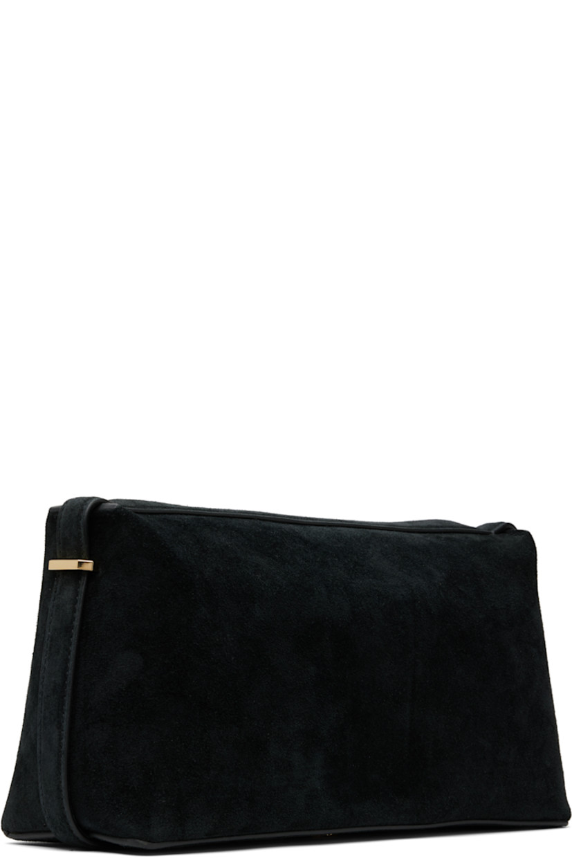 LWG-certified suede clutch. 

· Gold-tone logo stamp at face
· Tab-slot strap at base
· Zip closure
· Card slot at interior
· Microfiber lining
· Gold-tone hardware
· H6.25" x W12" x D4"

Supplier color: Black