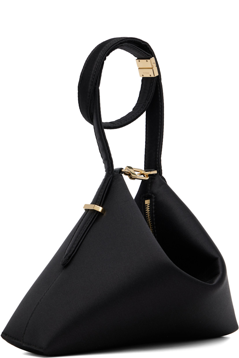 Double-faced silk-blend satin clutch. 

· Tab-slot fastening at wrist strap
· Lanyard-clasp fastening at top
· Logo stamp at face
· Zip closure
· Microsuede lining
· Gold-tone hardware
· H7.5" x W9" x D2.5"

Supplier color: Black