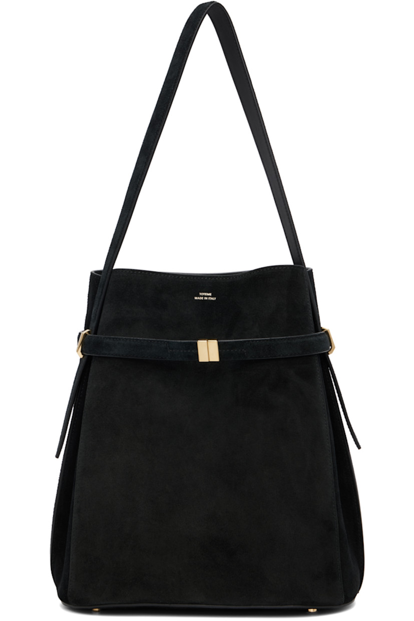 LWG-certified suede shoulder bag.

· Fixed shoulder strap
· Logo stamp and turn-lock fastening at face
· Bumper studs at base 
· Lanyard-clasp fastening at throat
· Patch pockets at interior 
· Gold-tone hardware
· H12" x W10.5" x D6"

Supplier color: Black