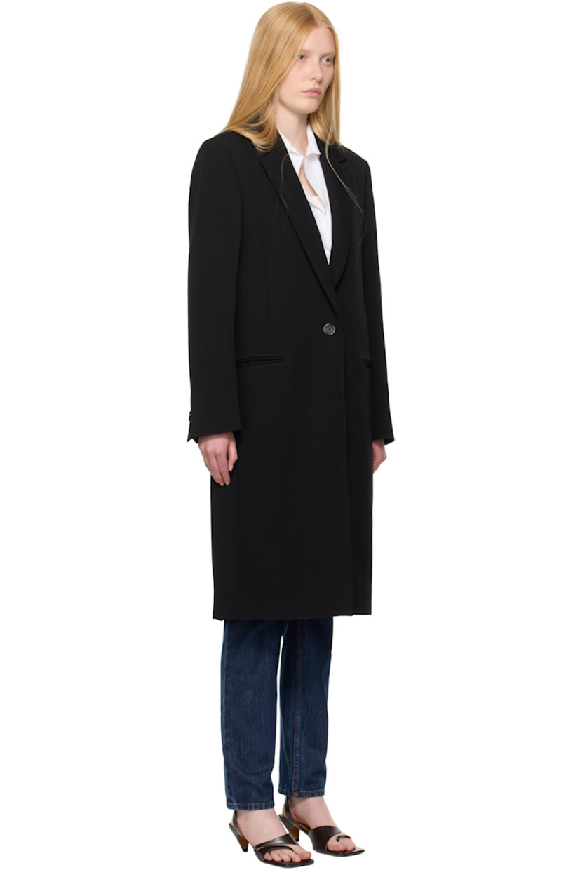 Wool-blend canvas coat.

· Notched lapel
· Button closure
· Welt pockets
· Padded shoulders
· Surgeon's cuffs
· Central vent at back hem
· Welt pocket at interior
· Full viscose satin lining

Supplier color: Black