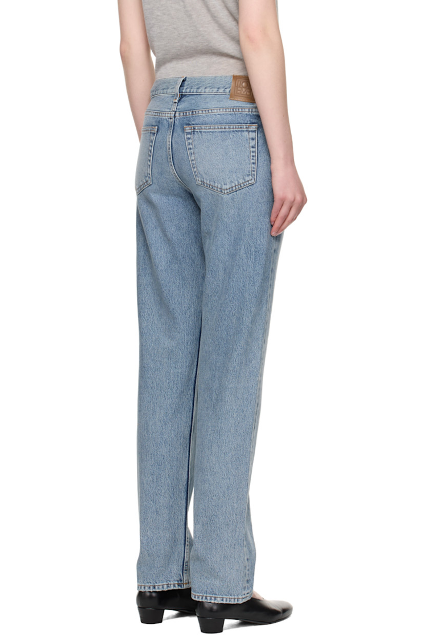 Non-stretch organic cotton denim jeans. Fading, whiskering, and subtle distressing throughout. 

· Straight-leg 
· Low-rise 
· Belt loops
· Five-pocket styling
· Zip fly 
· Logo patch at back waistband
· Contrast stitching in tan

Supplier color: True vintage