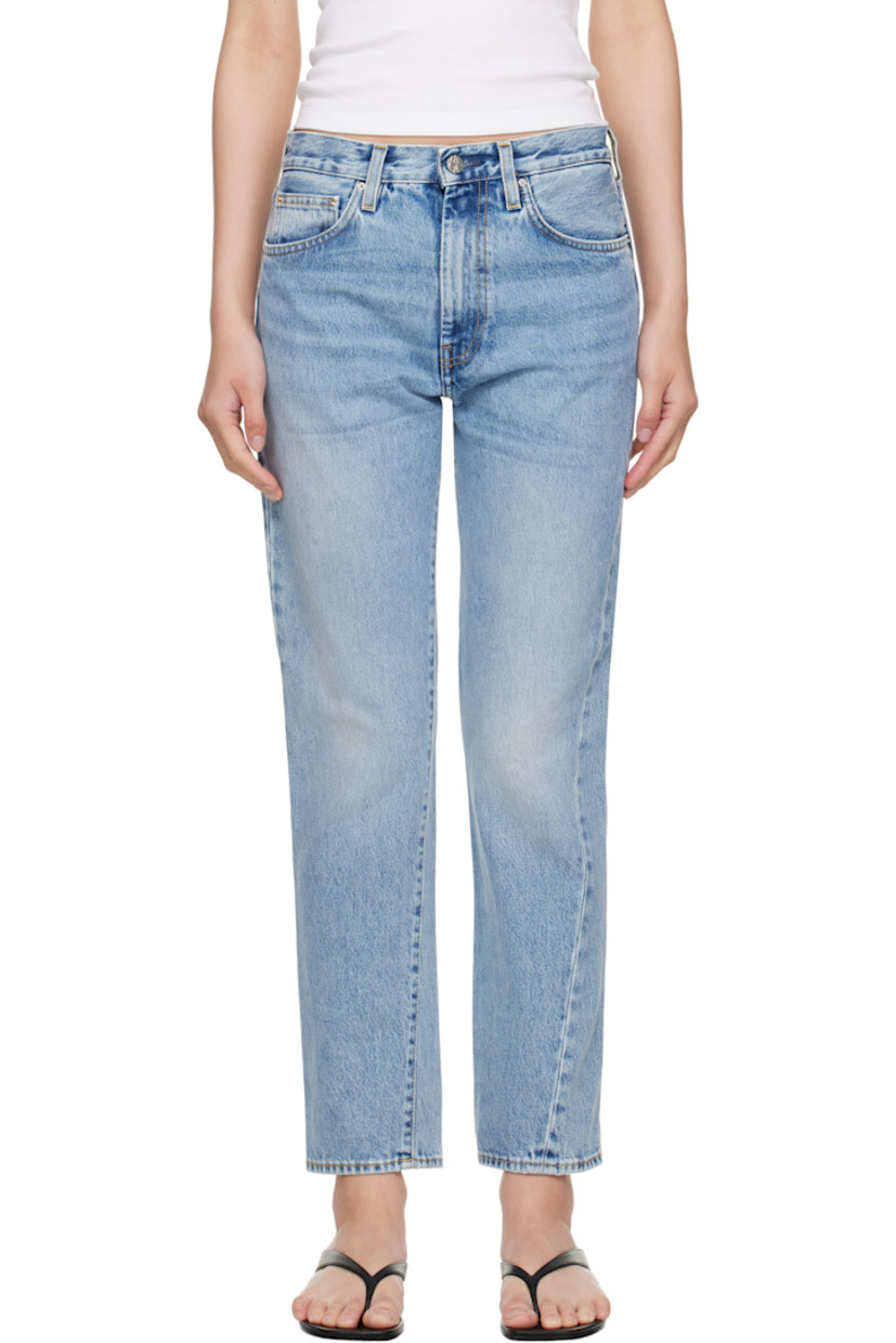 Non-stretch organic cotton denim jeans. Fading and whiskering throughout.

· Straight-leg
· Mid-rise
· Belt loops
· Five-pocket styling
· Zip fly
· Twisted outseams
· Leather logo patch at back waistband
· Silver-tone hardware
· Contrast stitching in tan

Supplier color: Worn blue