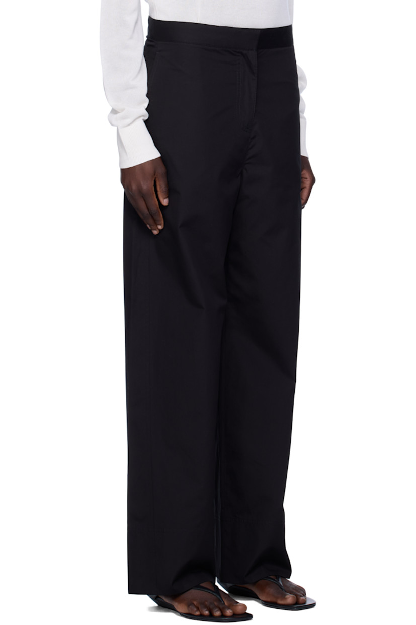 Straight-leg organic cotton poplin trousers.

· Lightweight
· Four-pocket styling
· Zip fly
· Twisted outseams

Supplier color: Black