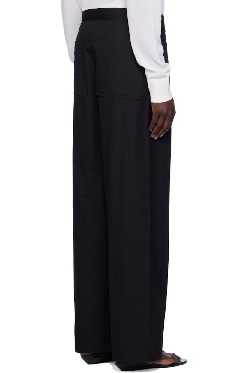 Straight-leg organic cotton poplin trousers.

· Lightweight
· Four-pocket styling
· Zip fly
· Twisted outseams

Supplier color: Black