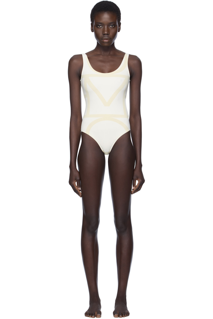 Stretch nylon jersey one-piece swimsuit. Logo printed throughout.

· Scoop neck
· Low back
· Fully lined

Supplier color: Sand