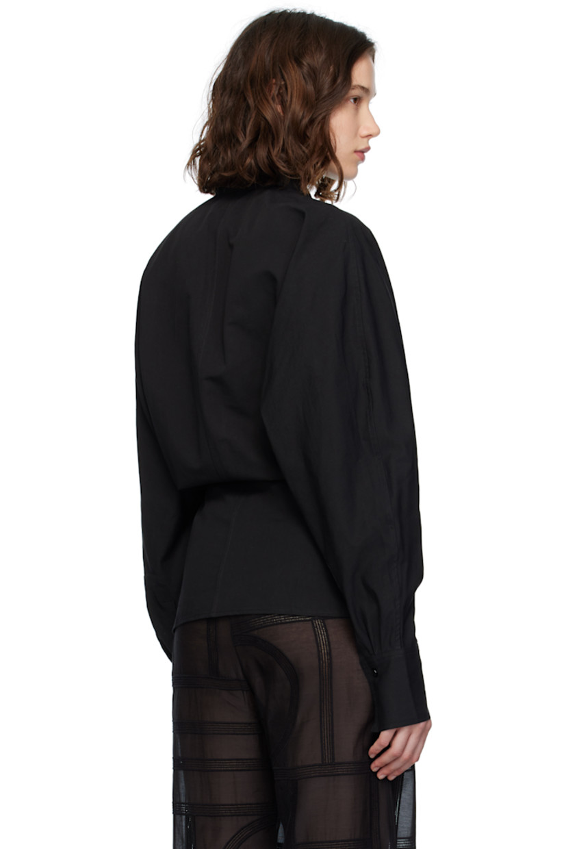Organic cotton- and linen-blend broadcloth blouse. 
 
· Notched lapel
· Offset button closure
· Topstitched detailing at front
· Dolman sleeves
· Buttoned barrel cuffs

Supplier color: Black