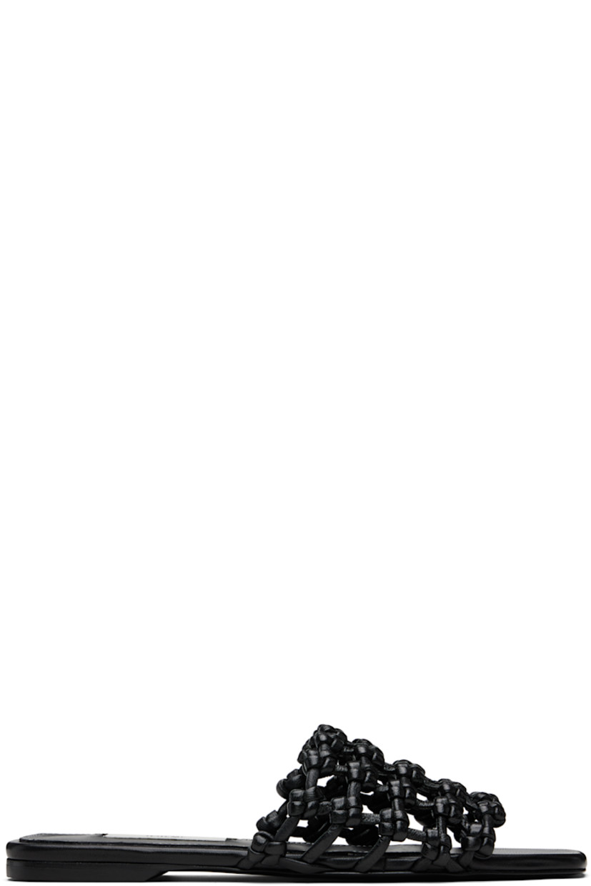 LWG-certified grained goatskin slides.

· Open square toe 
�· Braided strap at vamp
· Logo patch at padded sheepskin footbed
· Leather sole with rubber injection 

Supplier color: Black