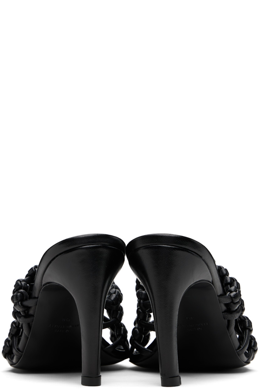 LWG-certified grained goatskin mules. 

· Open square toe 
· Braided strap at vamp
· Logo patch at padded sheepskin footbed
· Covered stiletto heel with rubber injection 
· Leather sole with rubber injection 
· Heel: H3.5"

Supplier color: Black