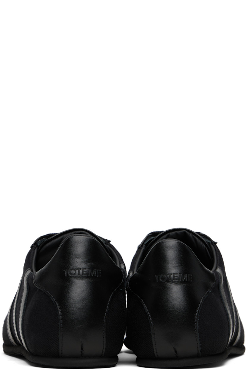 Low-top recycled cotton twill and grained leather sneakers.

· Square toe 
· Lace-up closure
· Padded tongue and collar
· Logo embossed at heel tab
· Leather lining
· Crêpe-rubber sole

Supplier color: Black