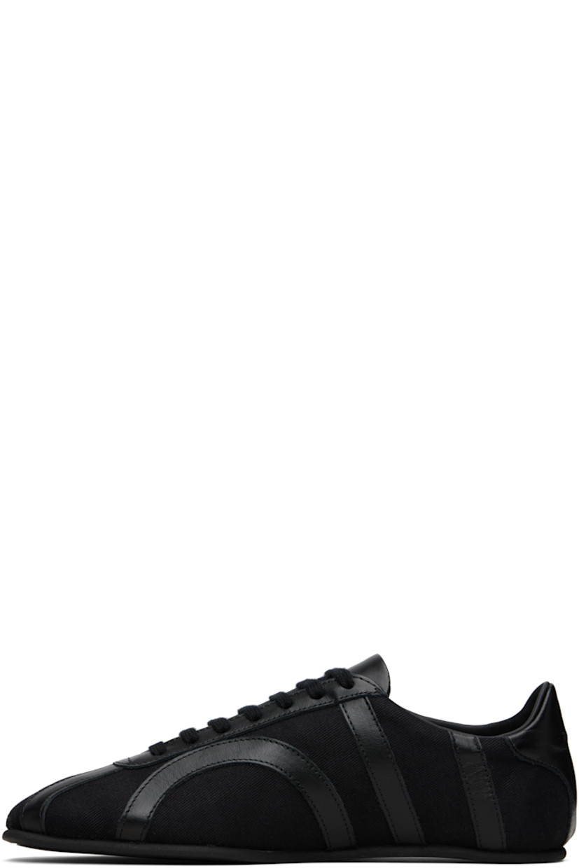 Low-top recycled cotton twill and grained leather sneakers.

· Square toe 
· Lace-up closure
· Padded tongue and collar
· Logo embossed at heel tab
· Leather lining
· Crêpe-rubber sole

Supplier color: Black