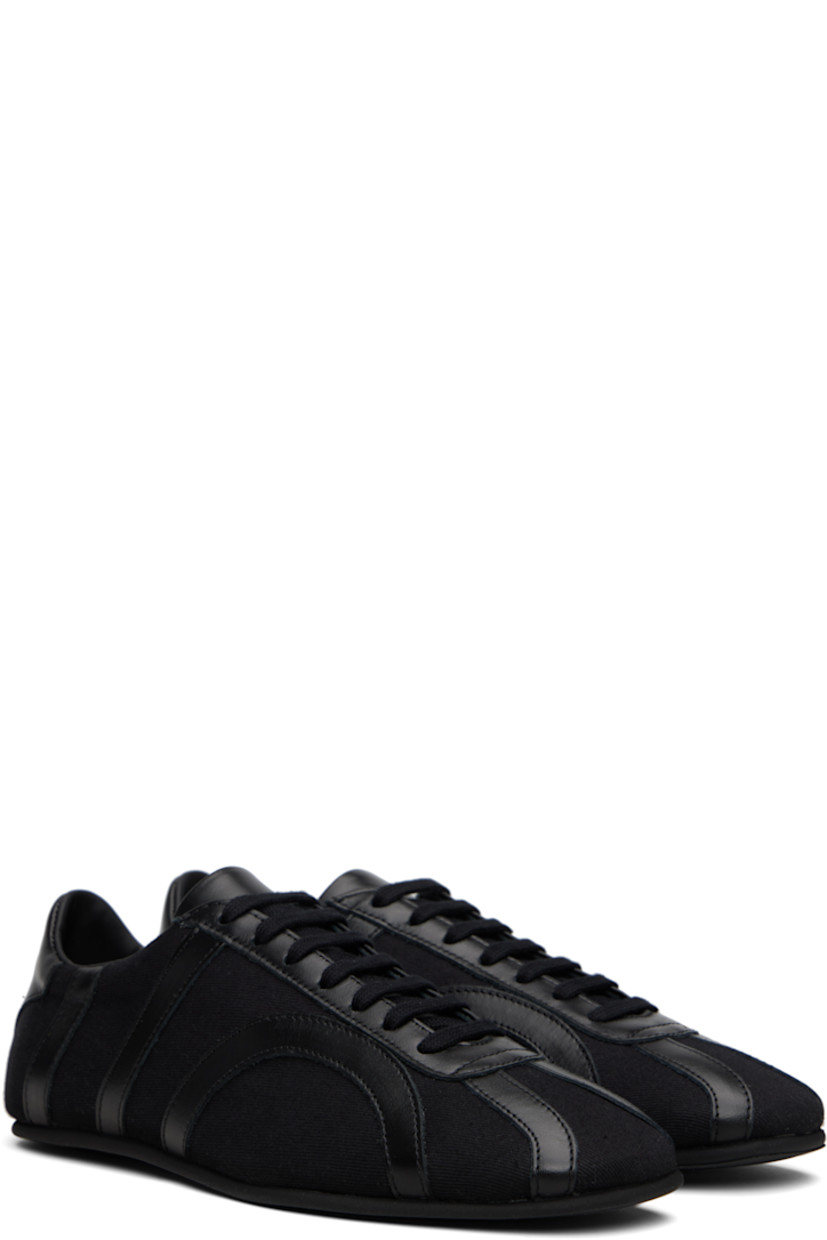Low-top recycled cotton twill and grained leather sneakers.

· Square toe 
· Lace-up closure
· Padded tongue and collar
· Logo embossed at heel tab
· Leather lining
· Crêpe-rubber sole

Supplier color: Black